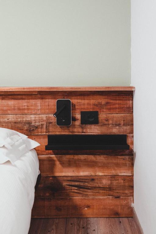 Postel nebo postele na pokoji v ubytování Smart Hotel Renzi