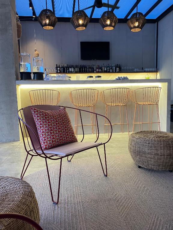 TV a/nebo společenská místnost v ubytování Eolia Sustainable Design Hotel