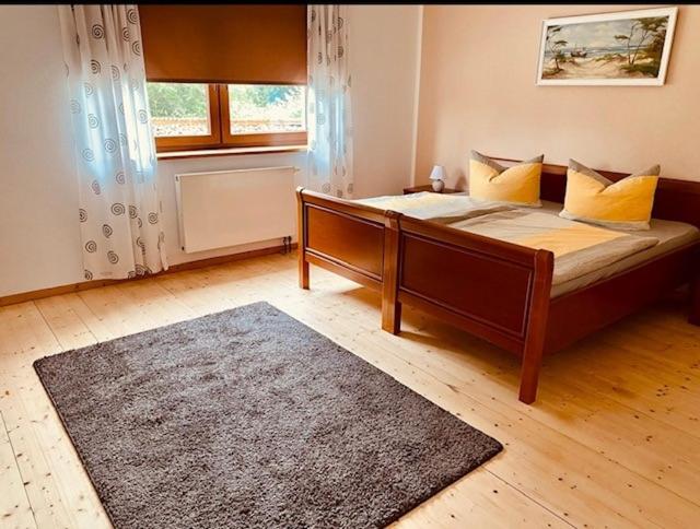 Postel nebo postele na pokoji v ubytování Ferienwohnung Wiek