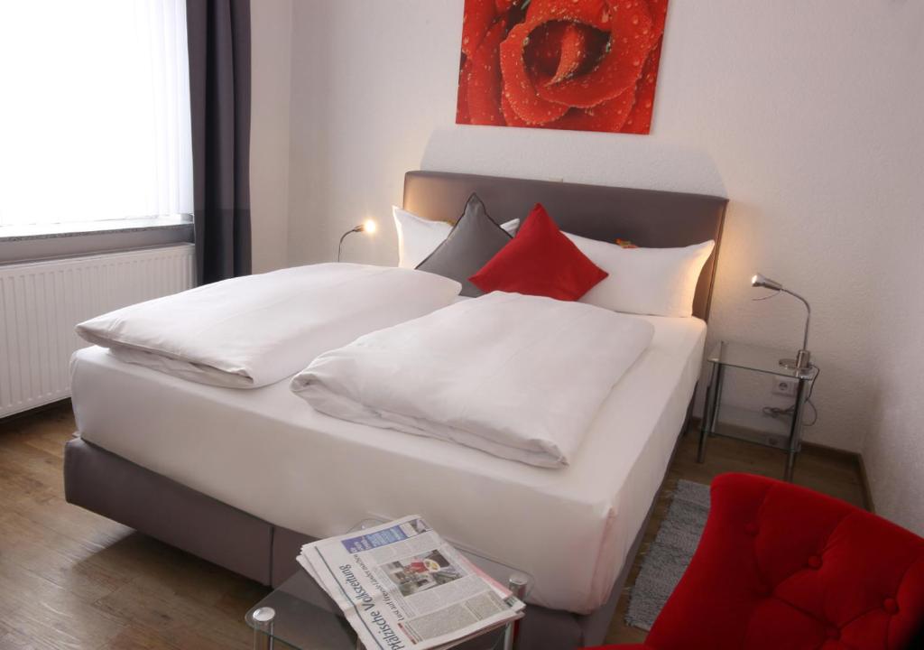 Postel nebo postele na pokoji v ubytování Hotel Rosenhof GmbH