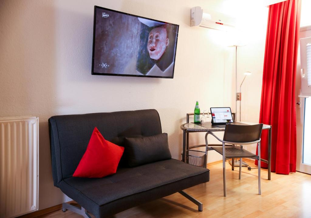 TV a/nebo společenská místnost v ubytování Hotel Rosenhof GmbH