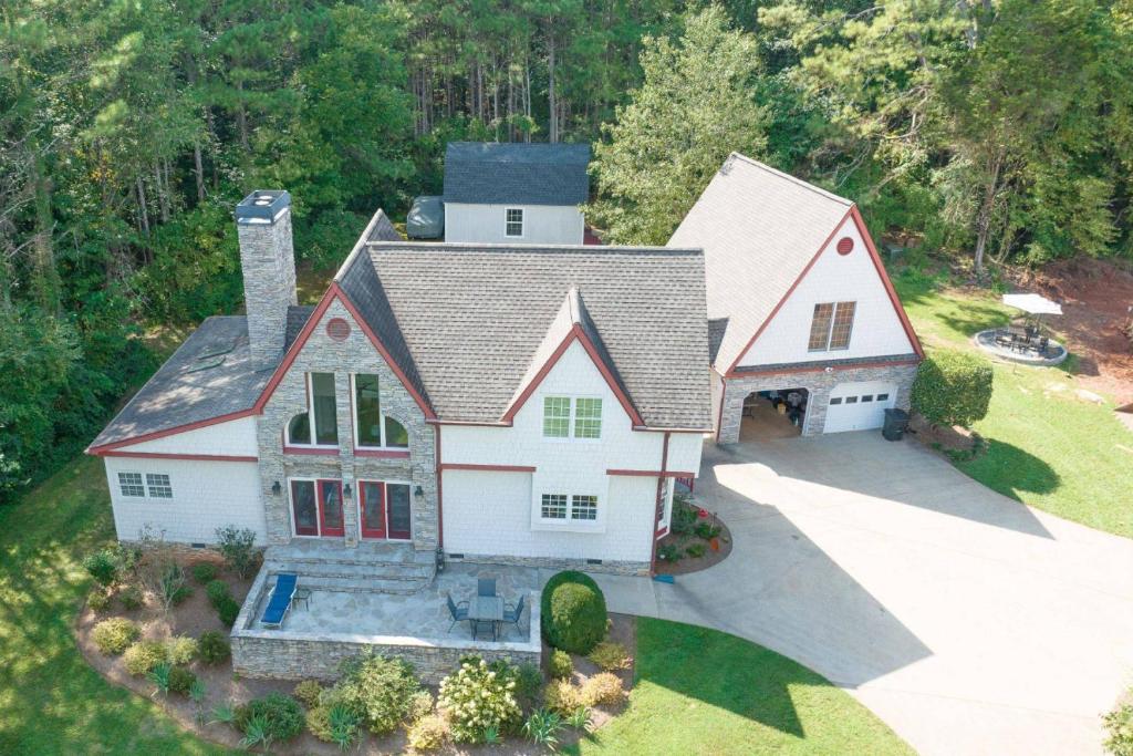 an aerial view of a house with a driveway at Blackjack Acres in Marietta