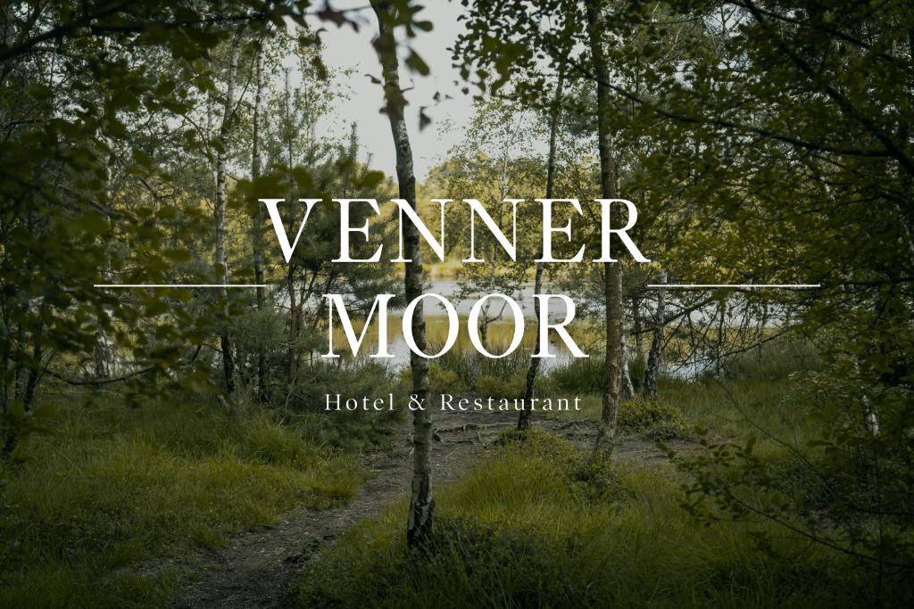 a picture of a dirt road in a forest at Hotel & Restaurant Venner Moor in Senden