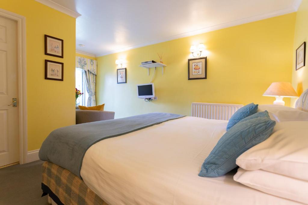 Postel nebo postele na pokoji v ubytování Homelands Guest House