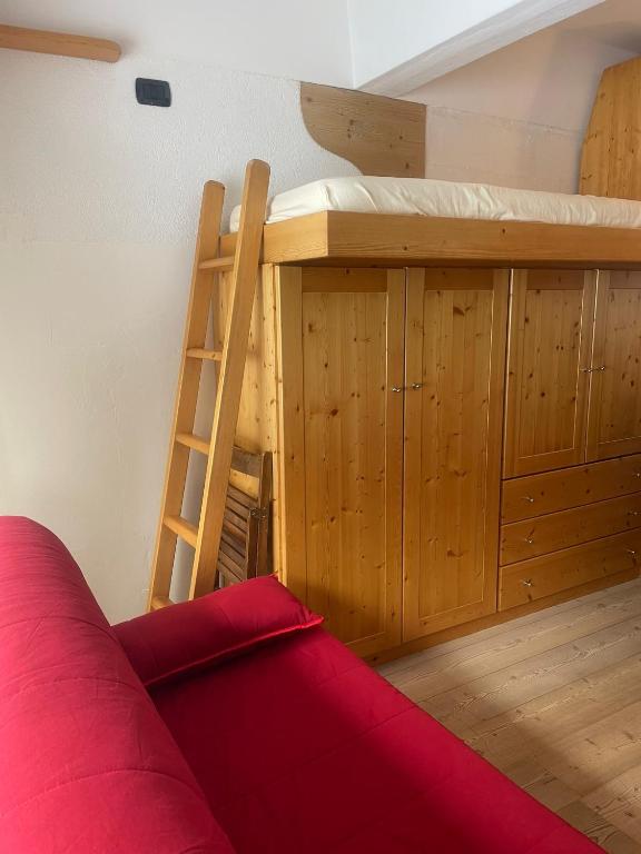 Postel nebo postele na pokoji v ubytování BAITA SOLE ALTO la tua casa sulle piste da sci