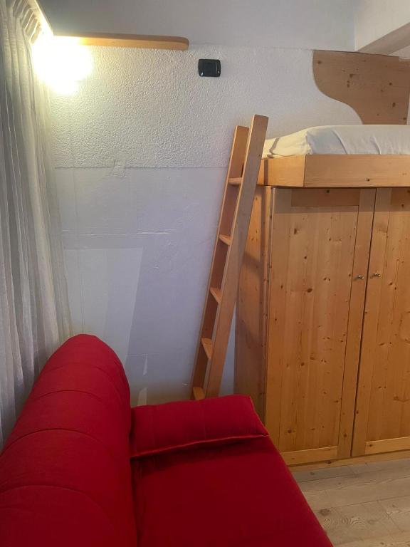 Postel nebo postele na pokoji v ubytování BAITA SOLE ALTO la tua casa sulle piste da sci