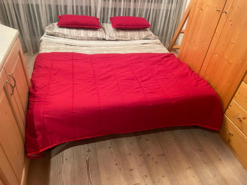 Postel nebo postele na pokoji v ubytování BAITA SOLE ALTO la tua casa sulle piste da sci