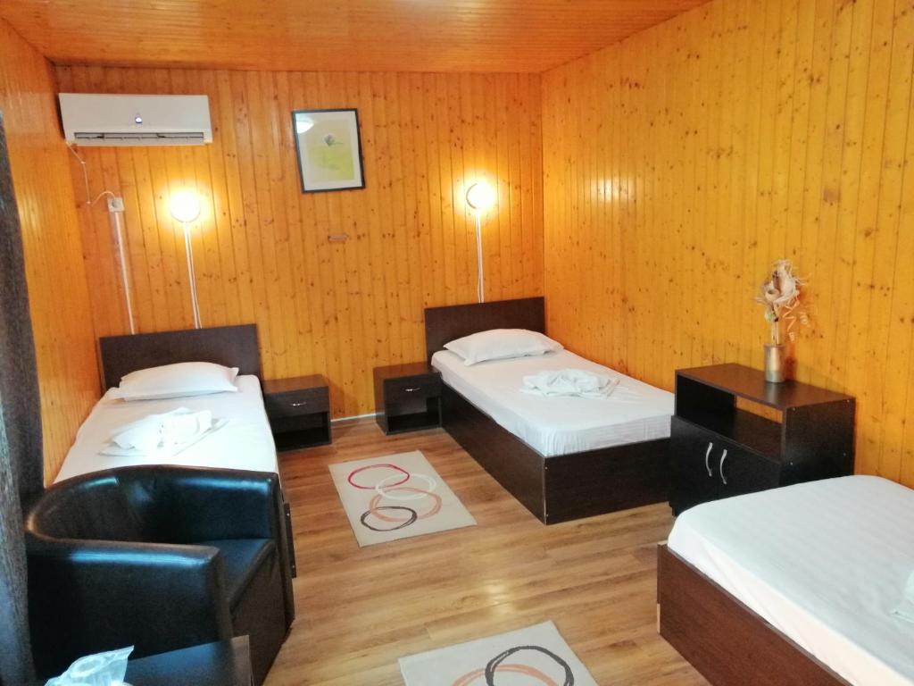 Postel nebo postele na pokoji v ubytování Pensiunea Solinia