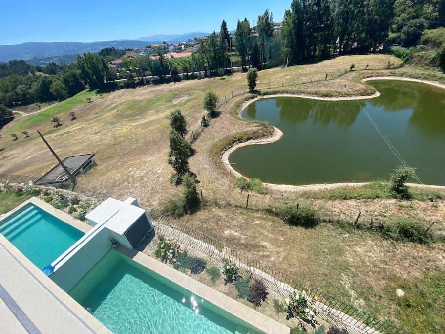 A piscina em ou perto de Luxury Home - Vila Golfe Amarante