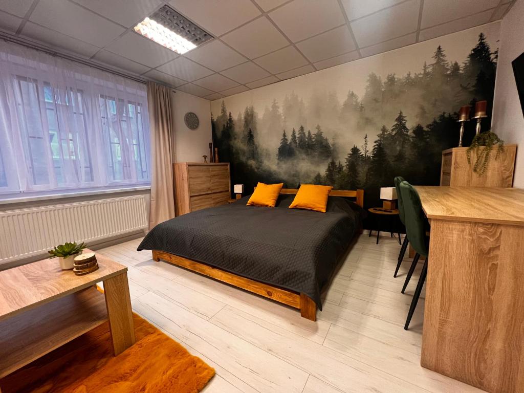 Posteľ alebo postele v izbe v ubytovaní Apártmany v centre - vlastná izba so spoločnou kuchyňou a kúpeľnou môže byť zdieľaná 2 inými izbami