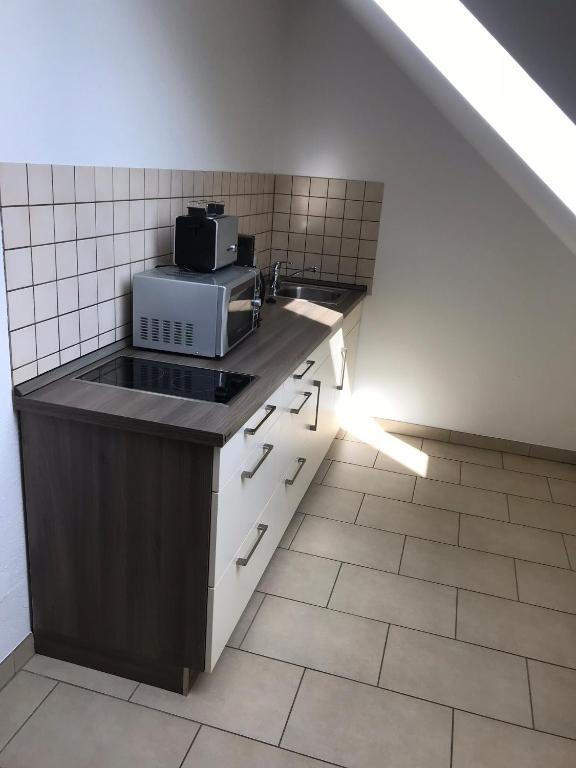 Kuchyň nebo kuchyňský kout v ubytování Laupus-Hof