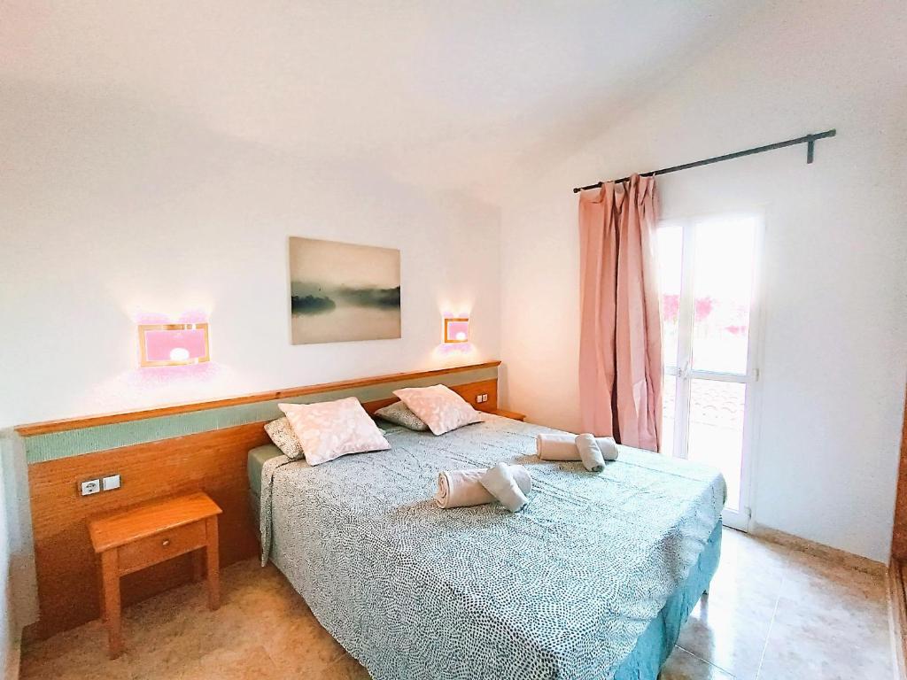 Posteľ alebo postele v izbe v ubytovaní Cozy Bungalow Maspalomas Green