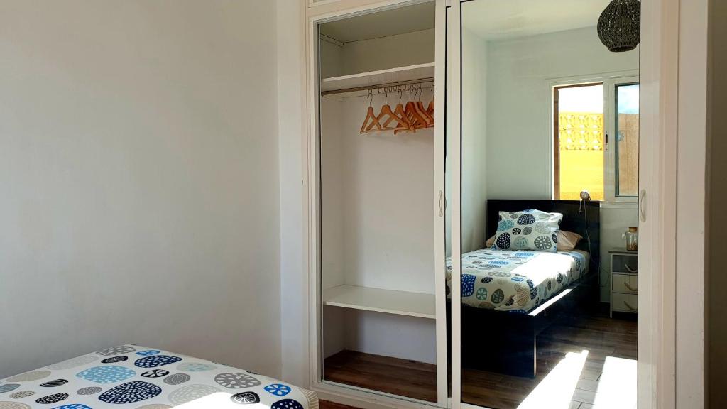 Postel nebo postele na pokoji v ubytování Beach Apartment Poris - Seabreeze Poris