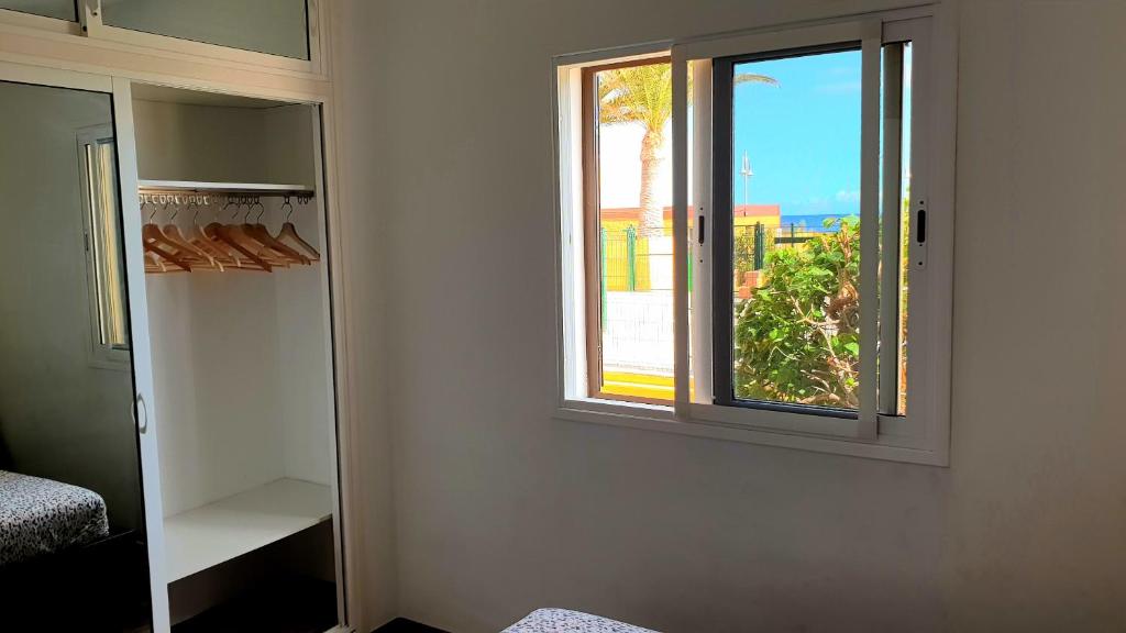 Postel nebo postele na pokoji v ubytování Beach Apartment Poris - Seabreeze Poris