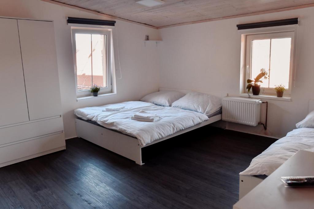 Postel nebo postele na pokoji v ubytování Apartmány Centrum