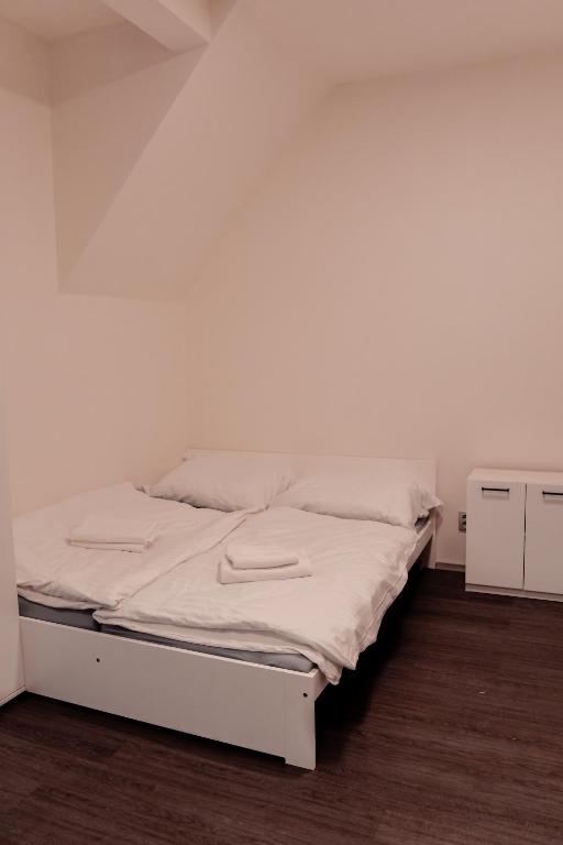 Postel nebo postele na pokoji v ubytování Apartmány Centrum
