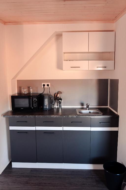 Kuchyň nebo kuchyňský kout v ubytování Apartmány Centrum
