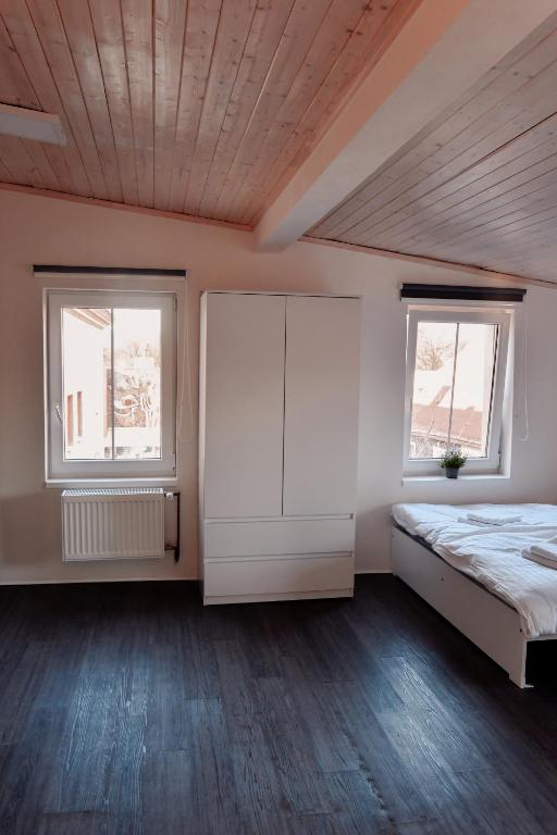 Postel nebo postele na pokoji v ubytování Apartmány Centrum