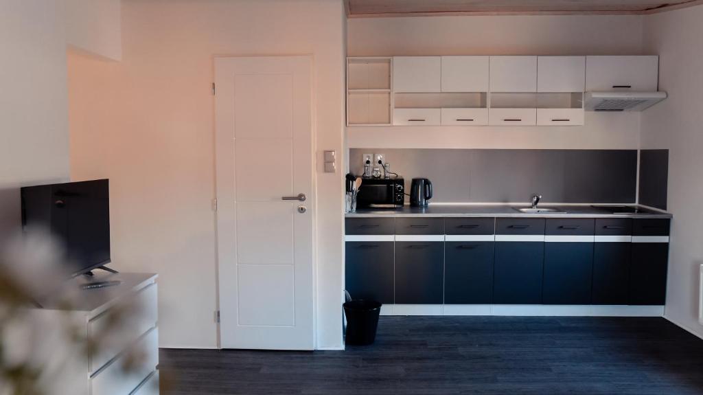 Kuchyň nebo kuchyňský kout v ubytování Apartmány Centrum