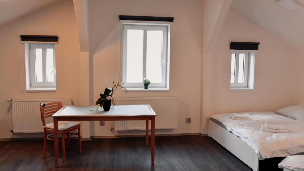Postel nebo postele na pokoji v ubytování Apartmány Centrum