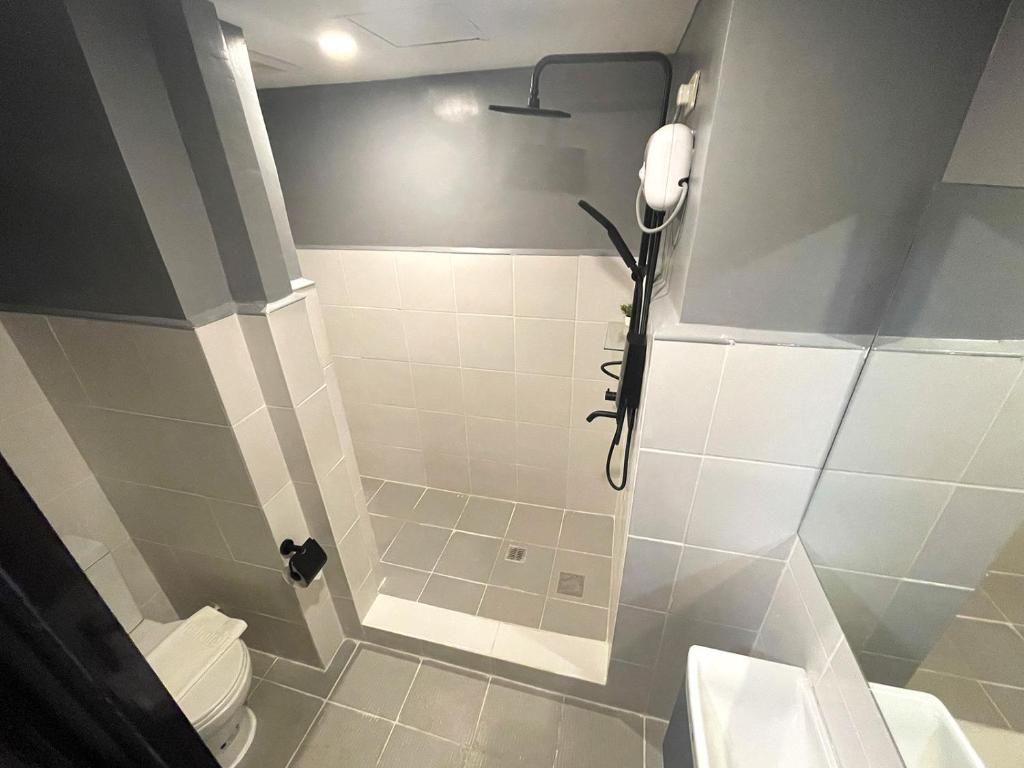 Koupelna v ubytování mySTAY Hotel BGC North