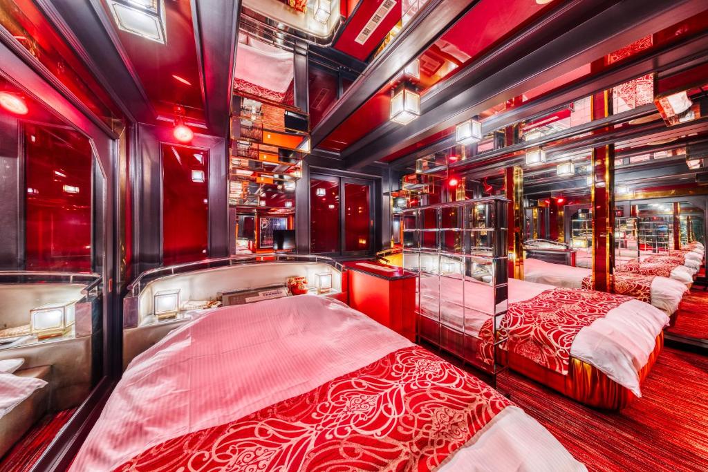 Postel nebo postele na pokoji v ubytování Hotel Chronos -Adult Only