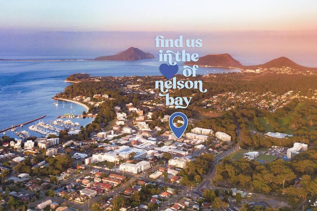 a city with the words find us into the region bay at Cool Change Accommodation And Venue Hire in Nelson Bay