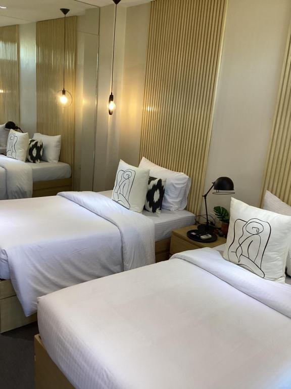 Postel nebo postele na pokoji v ubytování D' Residences