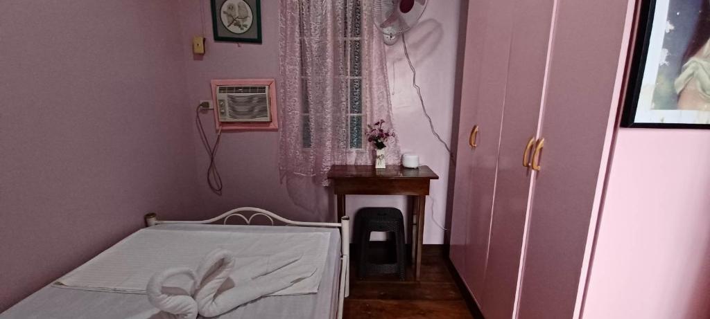 Postel nebo postele na pokoji v ubytování Donsol Aguluz Homestay