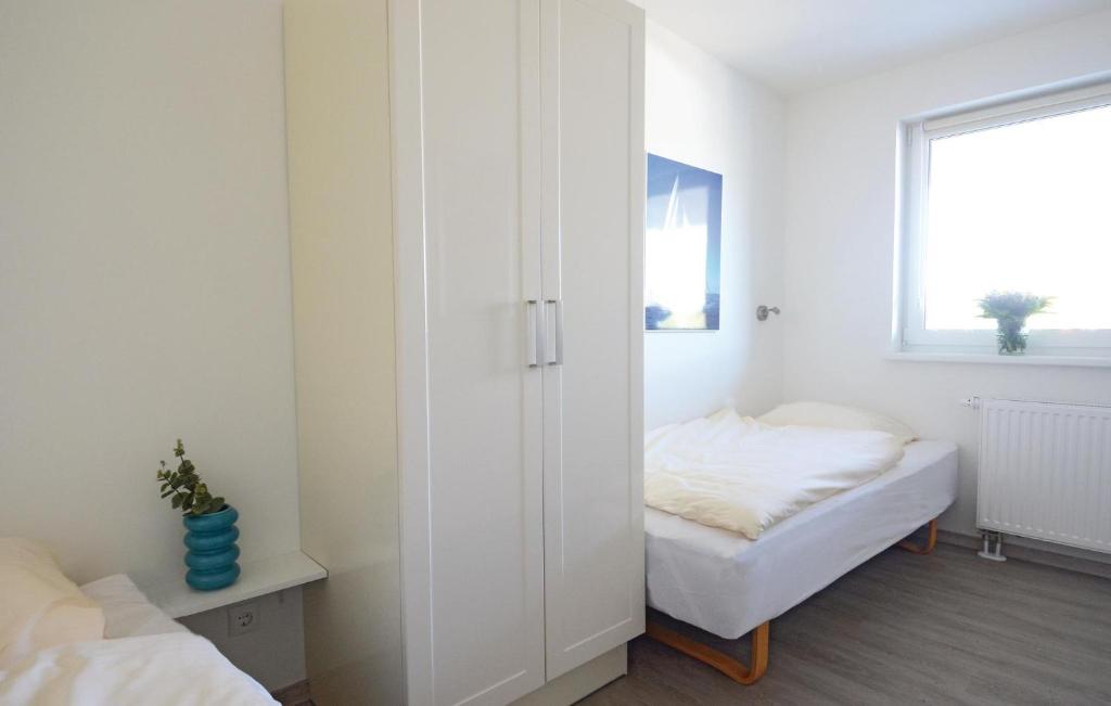 Postel nebo postele na pokoji v ubytování Appartement Seestern B