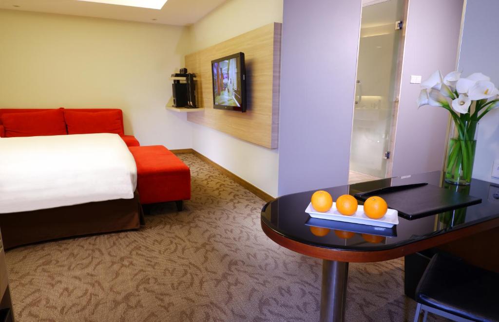 Postel nebo postele na pokoji v ubytování ASTON Pluit Hotel & Residence
