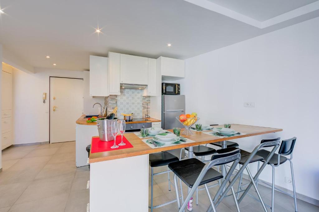Kuchyň nebo kuchyňský kout v ubytování Le Bristol V - Happy Rentals