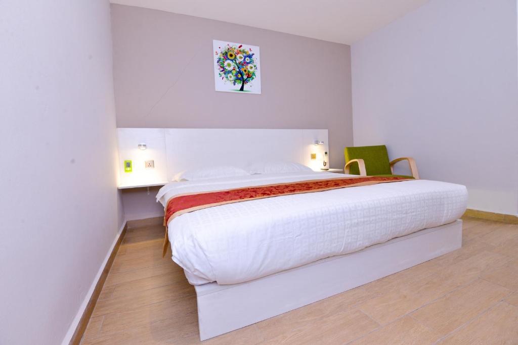 Postel nebo postele na pokoji v ubytování Hotel Pintar