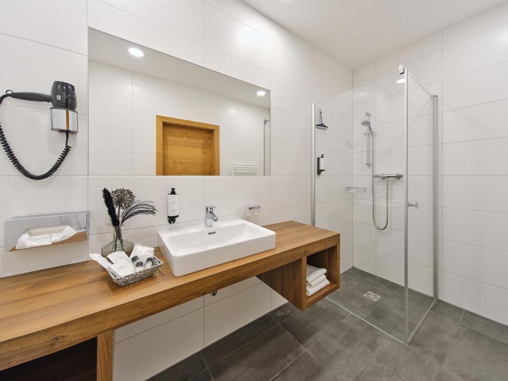 Koupelna v ubytování Hofwirthotel