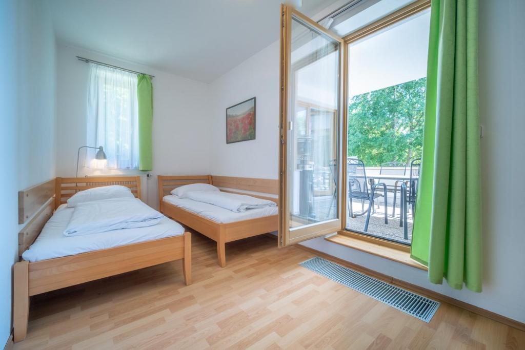 Postel nebo postele na pokoji v ubytování Apartment Riviera 507-6 Lipno Home