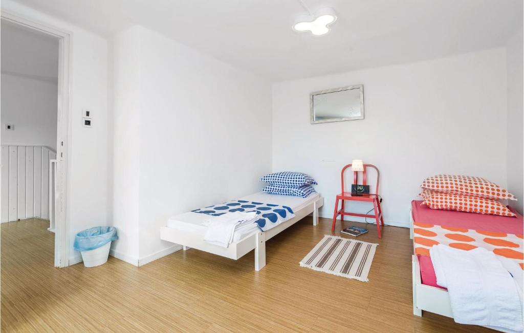 Posteľ alebo postele v izbe v ubytovaní 2 Bedroom Amazing Home In Kastav