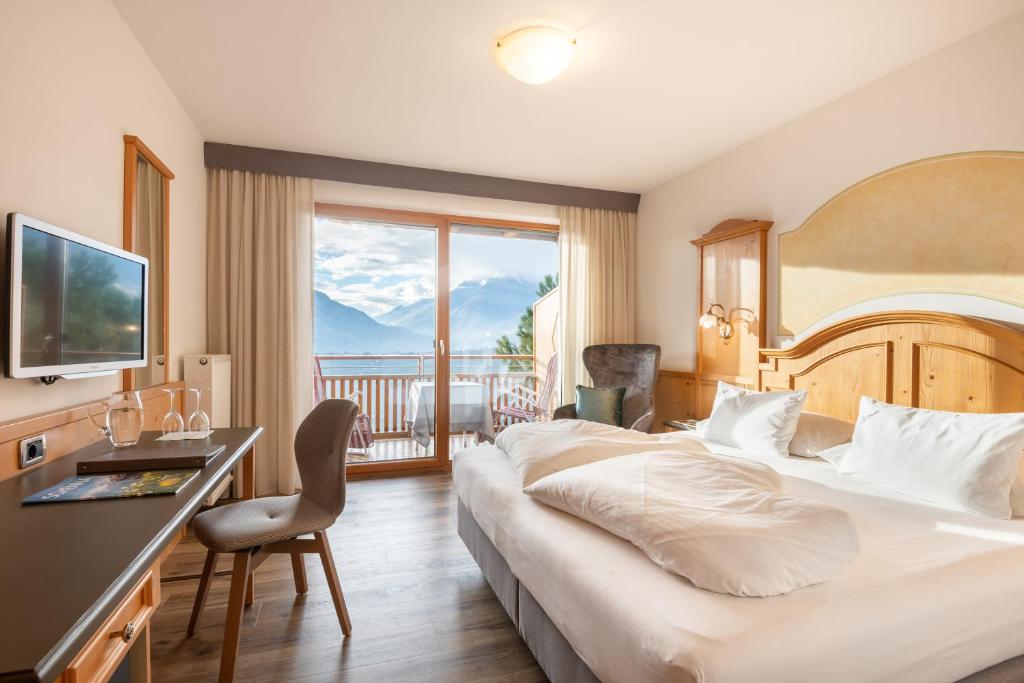 Postel nebo postele na pokoji v ubytování Hotel Garni Nachtigall