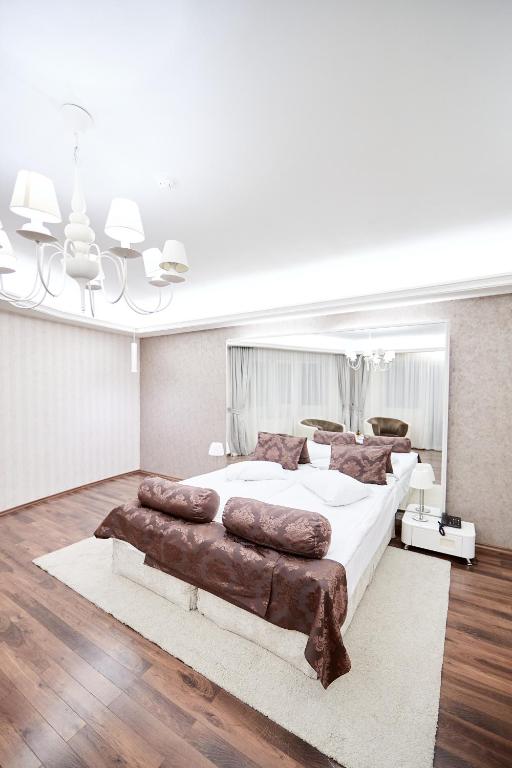 Postel nebo postele na pokoji v ubytování Hotel Belvedere