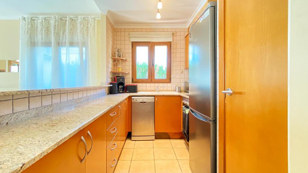 Kuchyň nebo kuchyňský kout v ubytování Villa El Palmar 2 en Denia