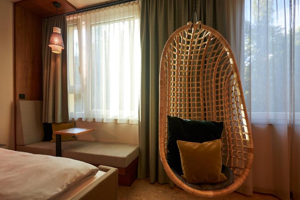 Postel nebo postele na pokoji v ubytování Cocoon Sendlinger Tor
