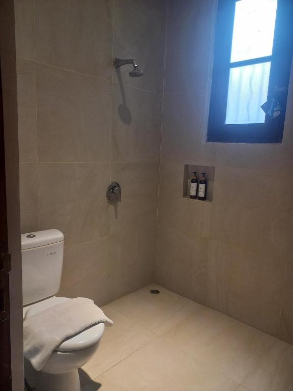 Koupelna v ubytování Villa Aquin