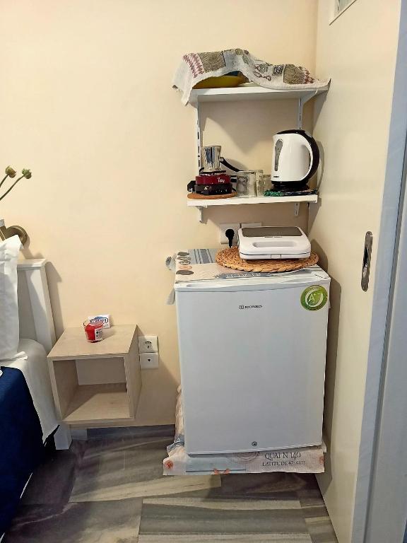 Kuchyň nebo kuchyňský kout v ubytování Marisa Rooms