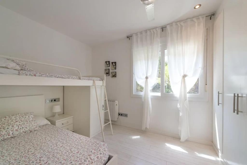 Postel nebo postele na pokoji v ubytování Villa Paraíso