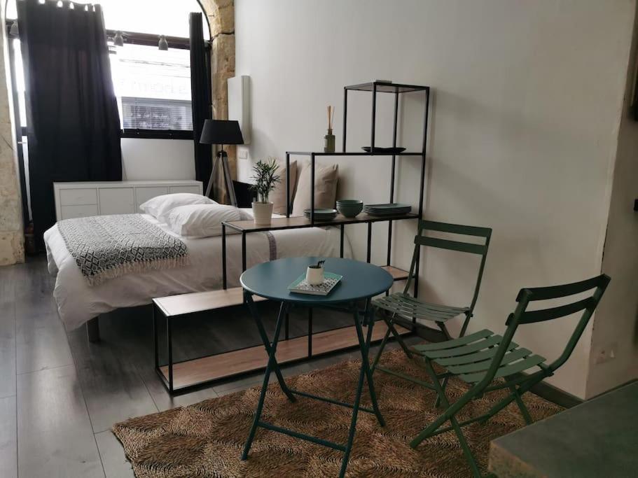 Posteľ alebo postele v izbe v ubytovaní La Boutique Studio centre ville