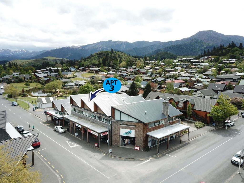 an aerial view of a town with a street at Central Apartment in Hanmer Springs