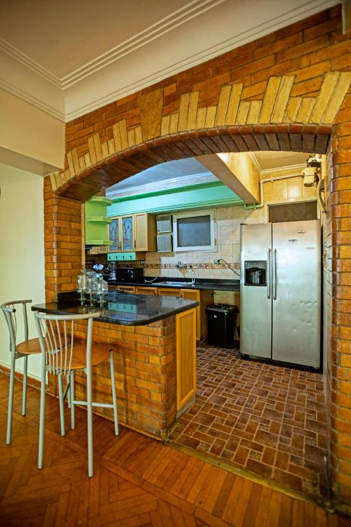 Una cocina o cocineta en Zamalek X Hostel