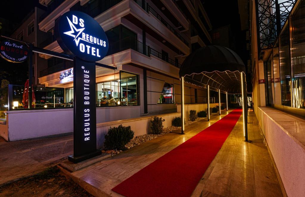 a red carpet in front of a building at night at DS REGULUS in Ankara