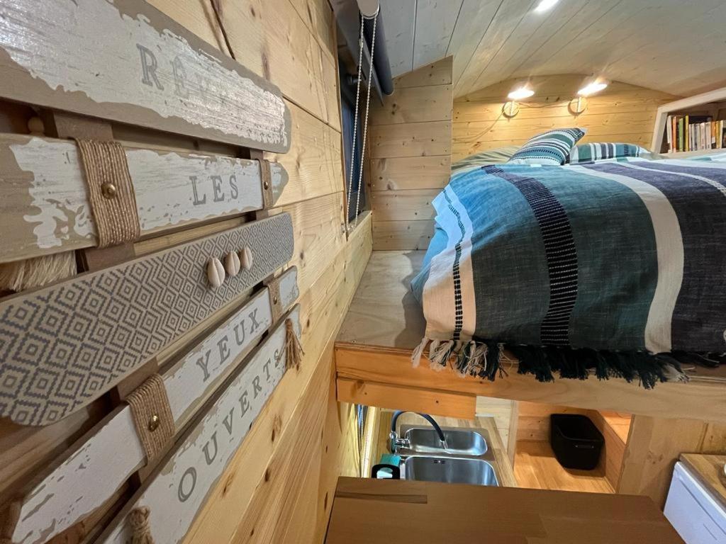 Postel nebo postele na pokoji v ubytování Tiny House