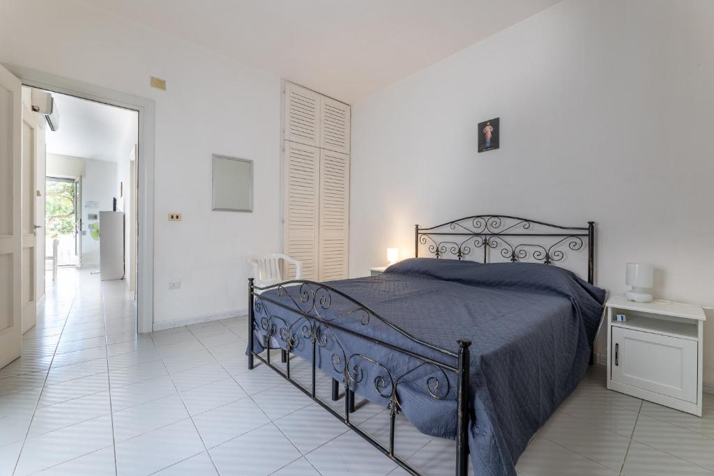 Postel nebo postele na pokoji v ubytování Residence Caletta