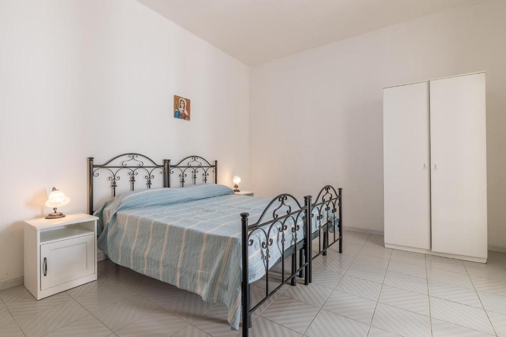 Postel nebo postele na pokoji v ubytování Residence Caletta
